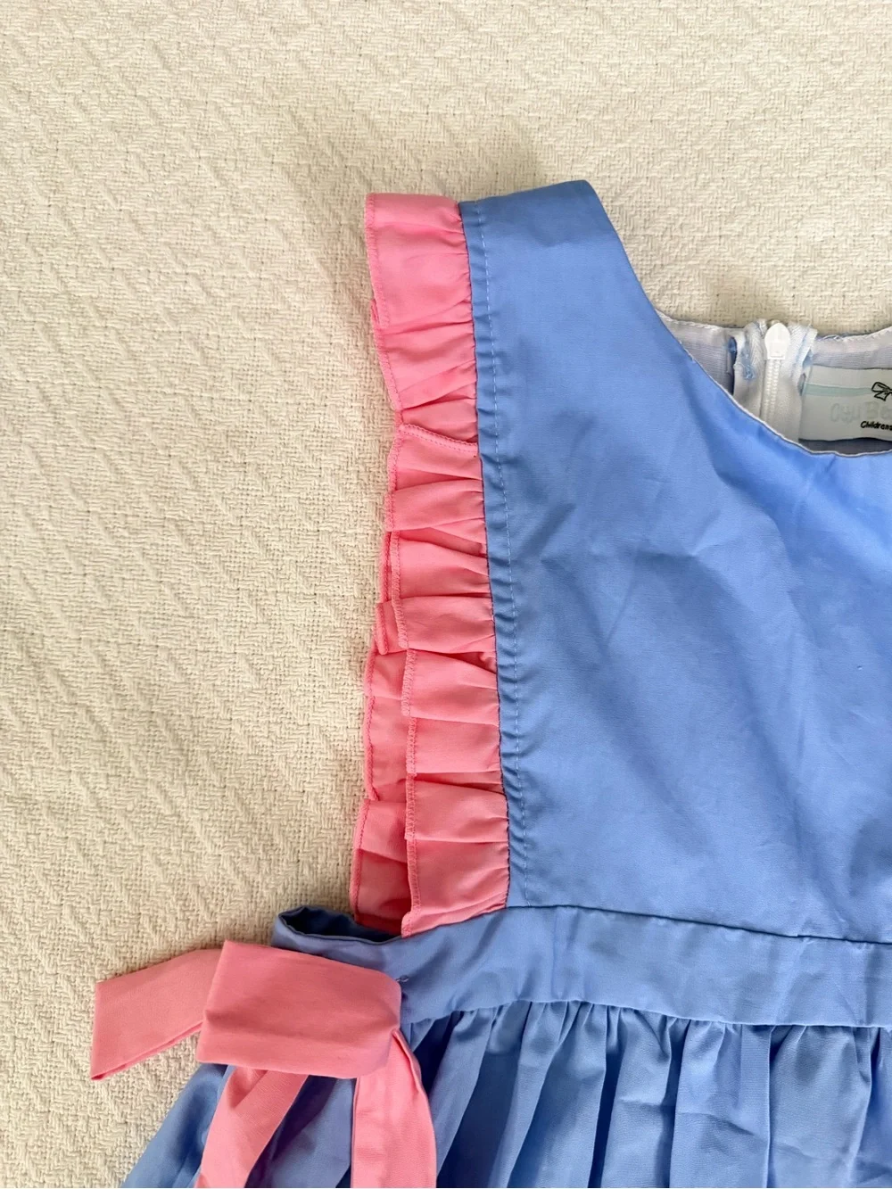 City Beautiful Children’s Boutique Blue Apron Dress Pink Ruffle Trim and Bows